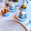 table with donuts, macarons, lattes