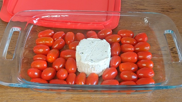 pyrex dish with grape tomatoes and boursin cheese